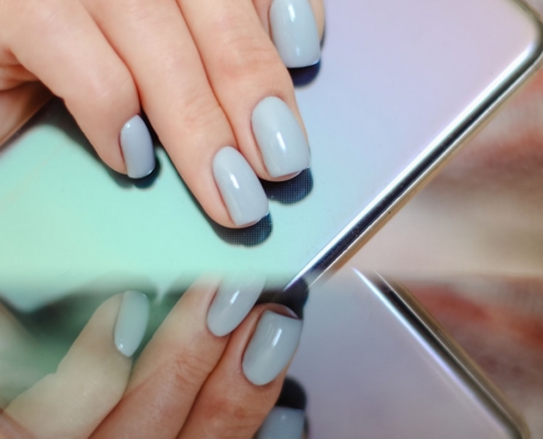 person holding silver iphone 6