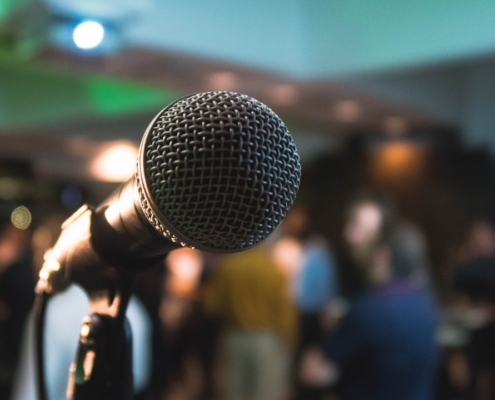 silver corded microphone in shallow focus photography
