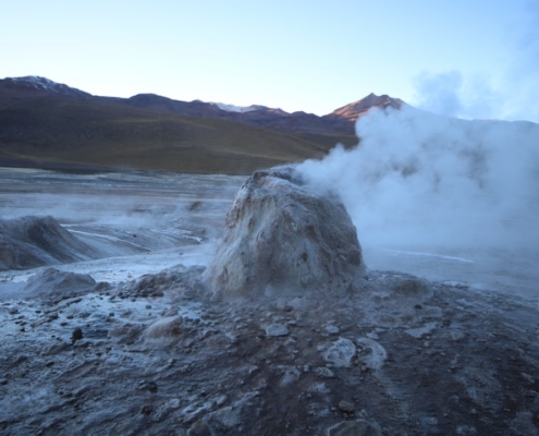 smoke coming from rocks viewing mountain