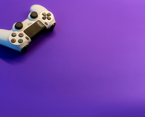 white and black game controller