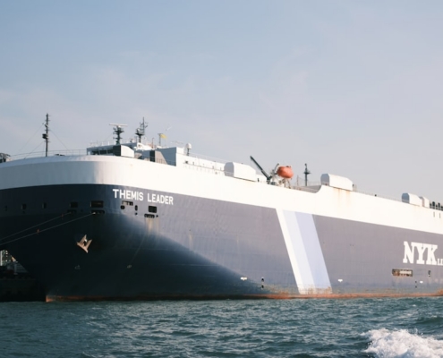 white and black ship on sea during daytime