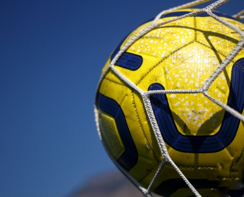 yellow and black soccer ball