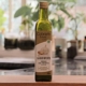 a bottle of garlic oil sitting on top of a counter