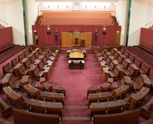 a large room filled with lots of wooden furniture