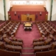a large room filled with lots of wooden furniture