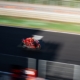a person riding a motorcycle on a race track