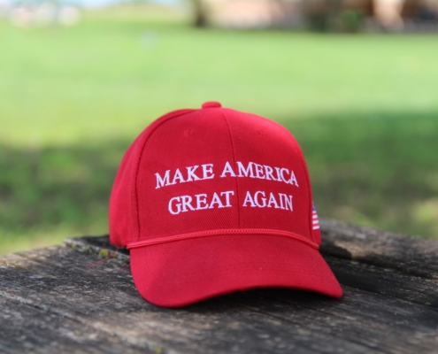 a red hat that says make america great again