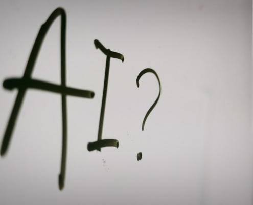 a sign with a question mark and a question mark drawn on it