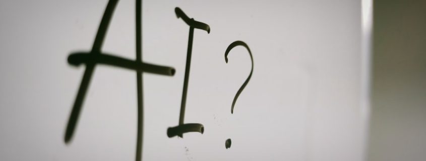 a sign with a question mark and a question mark drawn on it