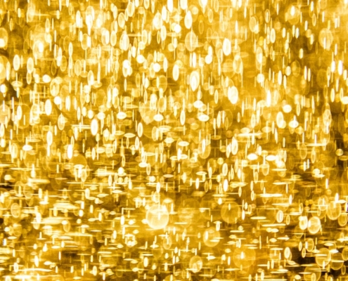 a yellow background with lots of small circles