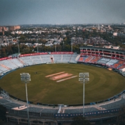 an aerial view of a baseball field in a city