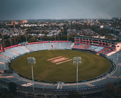 an aerial view of a baseball field in a city
