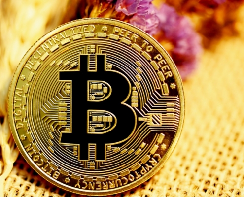 gold and black round coin