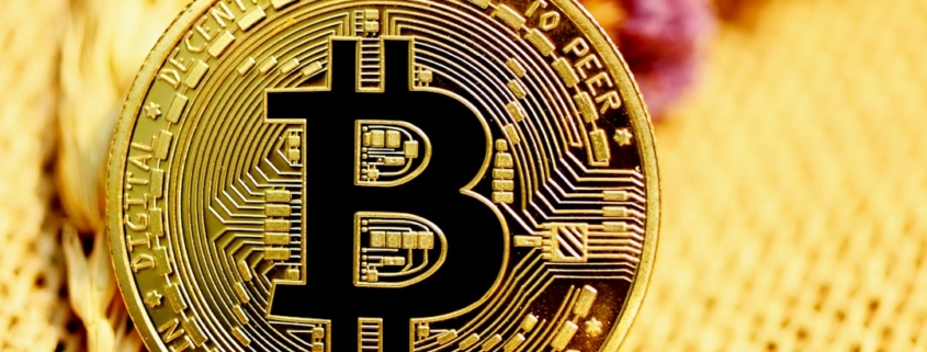 gold and black round coin