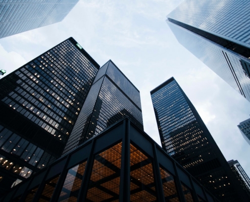low angle photo of city high rise buildings during daytime
