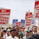 Marchers holding signs demanding the right to vote at the March on Washington