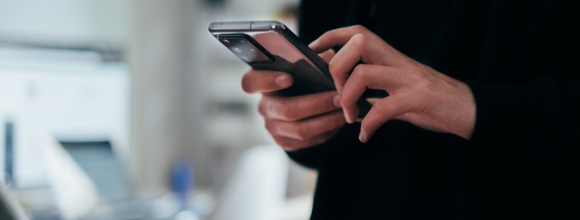 person holding black android smartphone