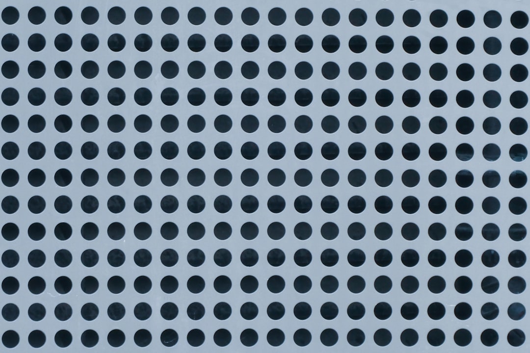 white and black polka dot textile